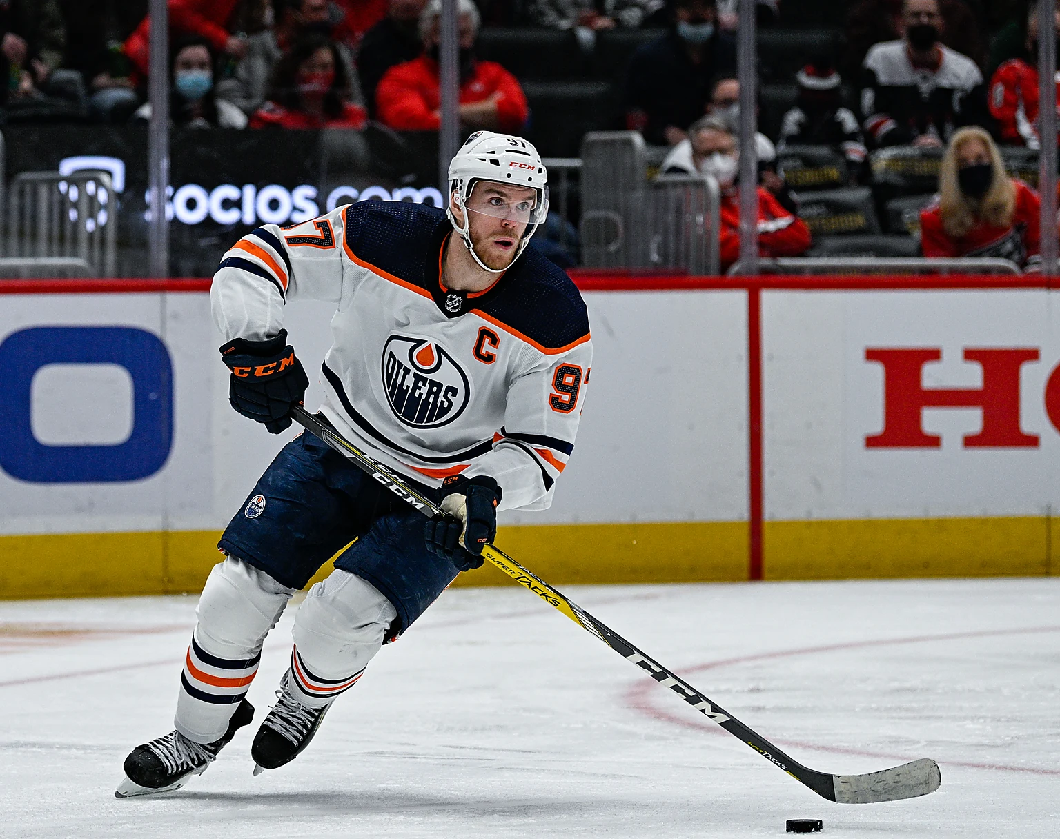Connor McDavid controlling the puck for Edmonton against Washington